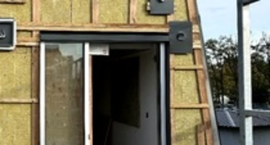Rigid mineral wool exterior insulation installed over the weather barrier on a Vancouver building